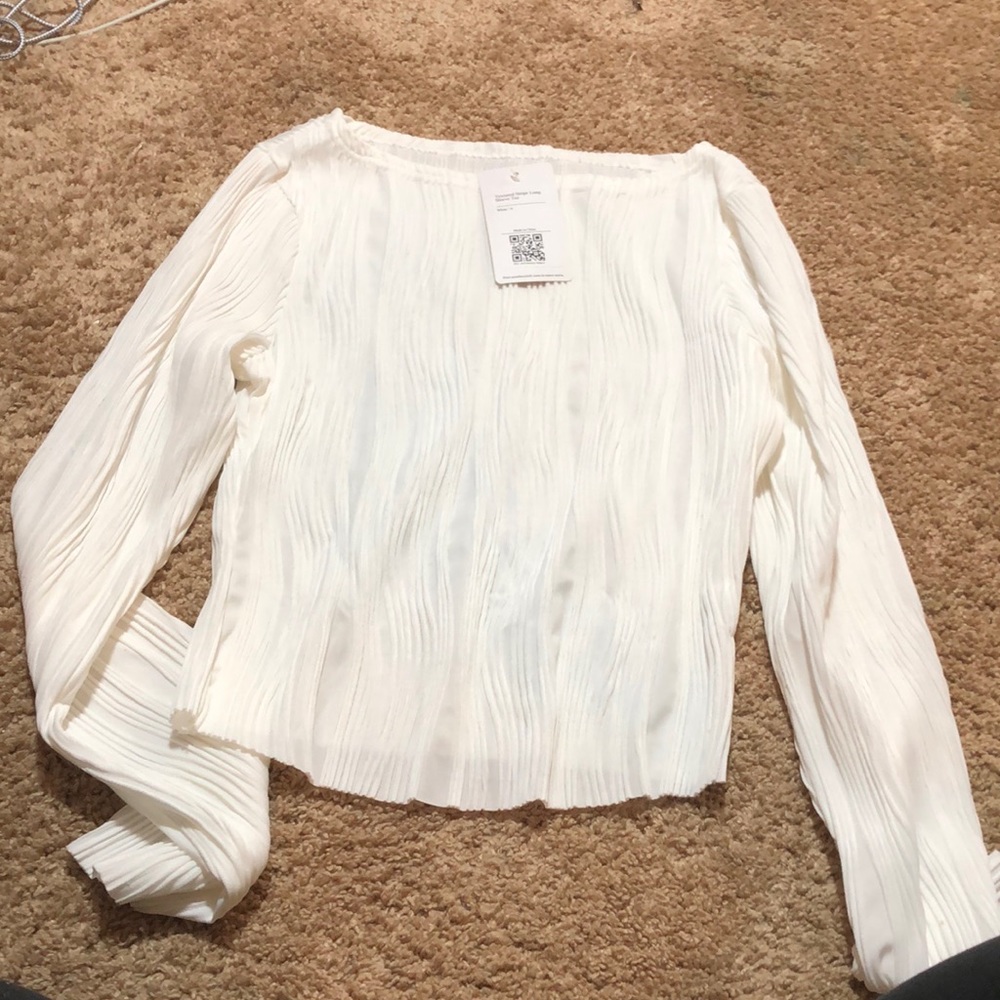 White long sleeve top